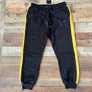 Boohoo Man Plus Size Man Script Slim Color Block Jogger in Yellow and Black -2XL
